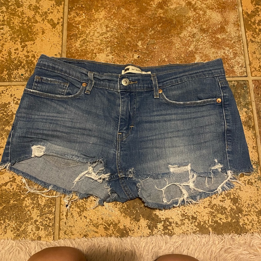 Levis womens 11 mid low rise jean shorts disstressed hand cut